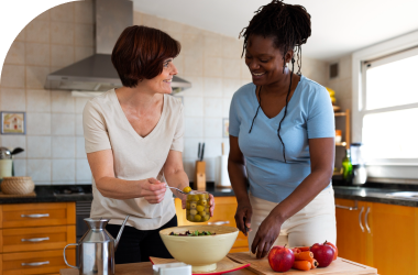 a-caregiver-prepares-a-nutritious-meal-for-an-elderly-person