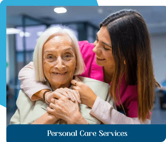 care giver cuddling elderly woman and both smiling