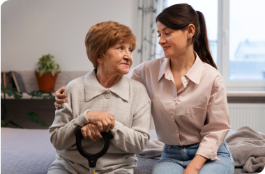 Old woman enjoying companionship and activities with caregiver