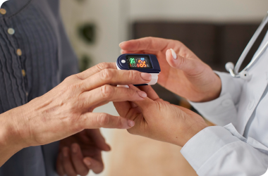 senior people receiving blood sugar monitoring and management service